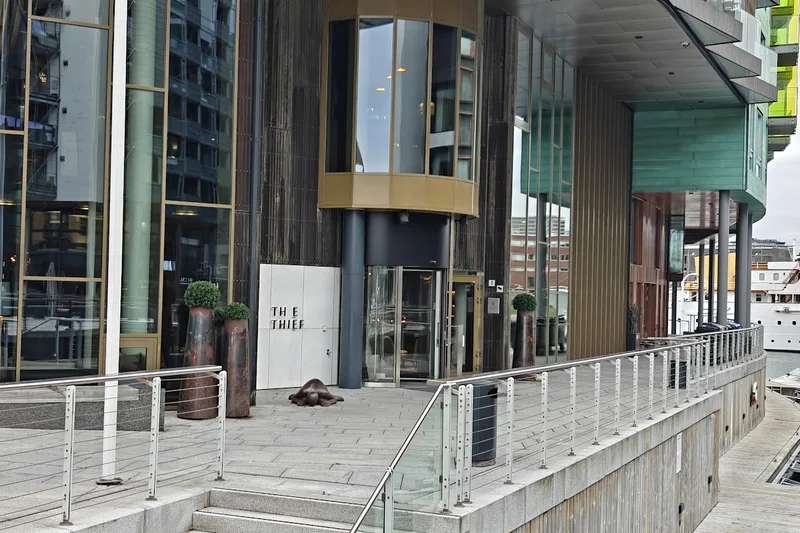 The main entrance of The Thief with its lantern and revolving door