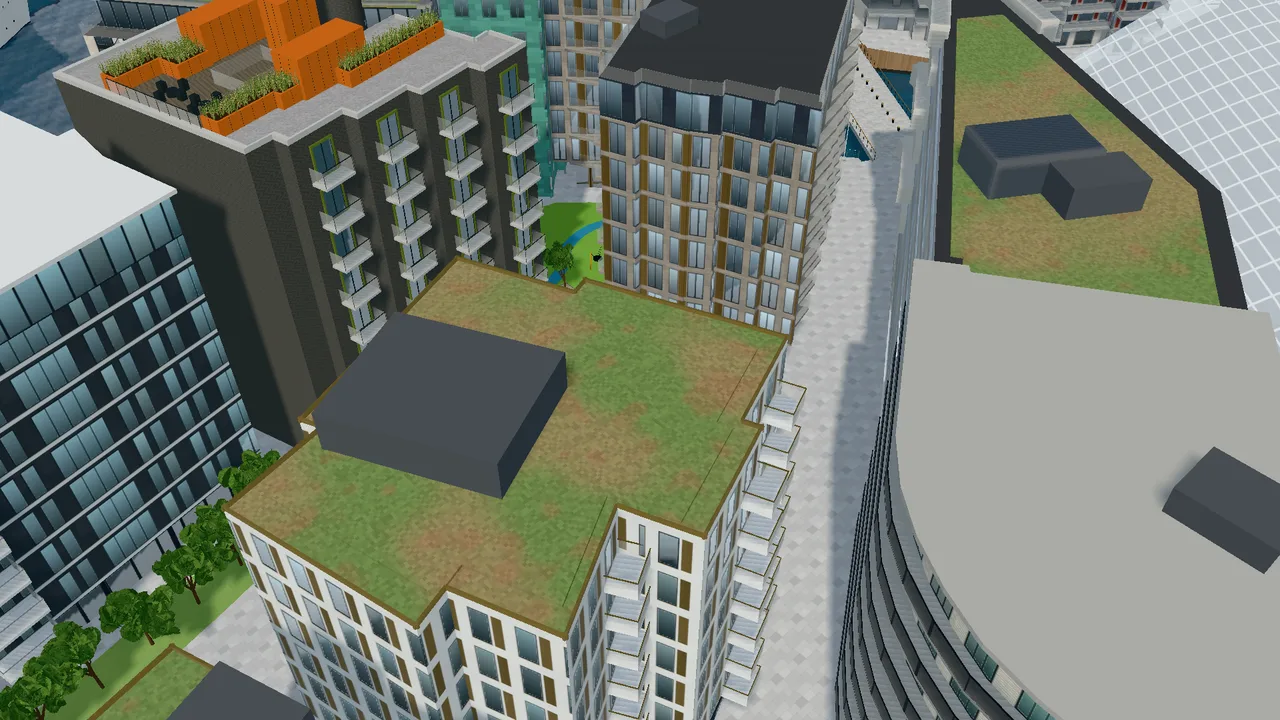 The buildings on Tjuvholmen seen at an angle from above, with varied façades in brick, copper, stone and glass.