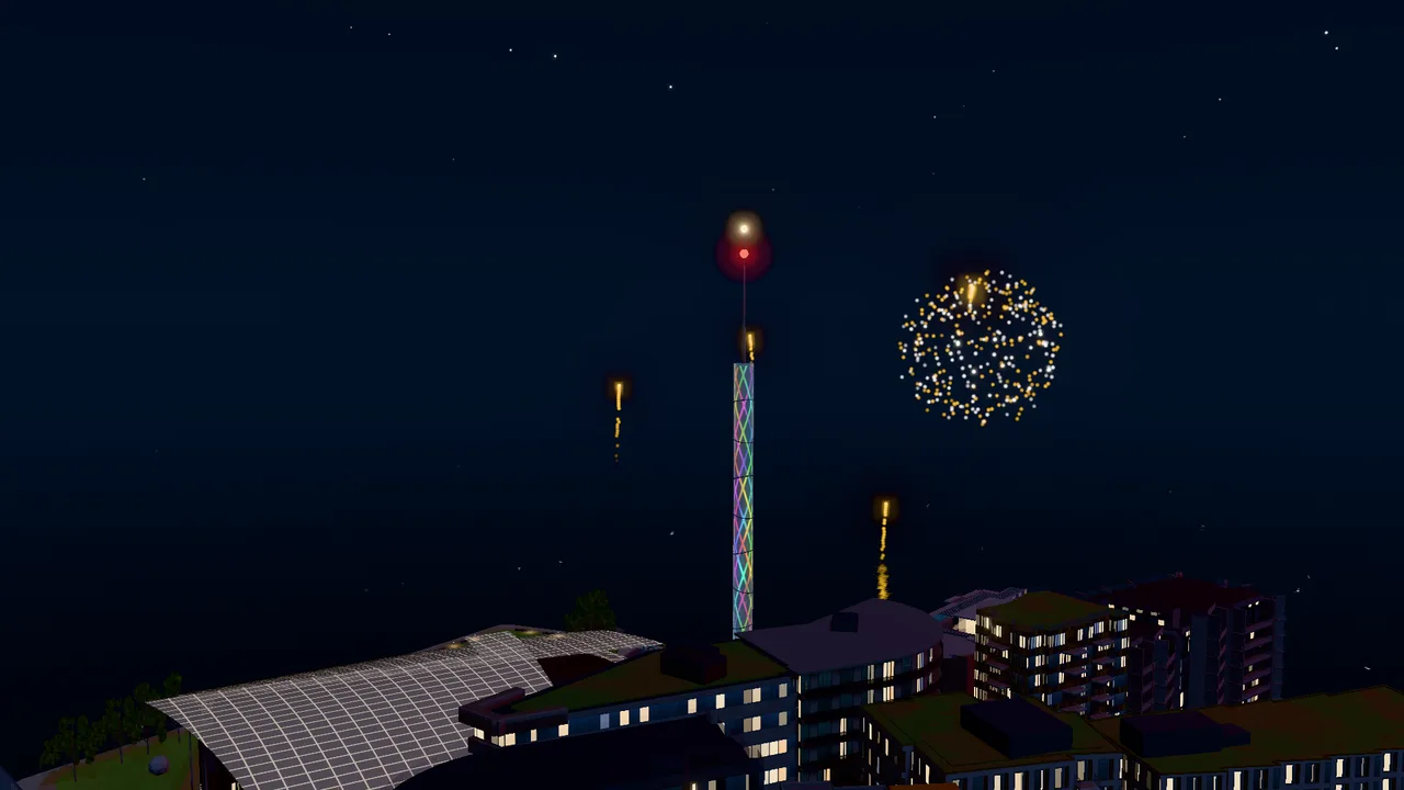 Tjuvholmen at night with fireworks over the harbour and Tjuvtitten in changing colours.