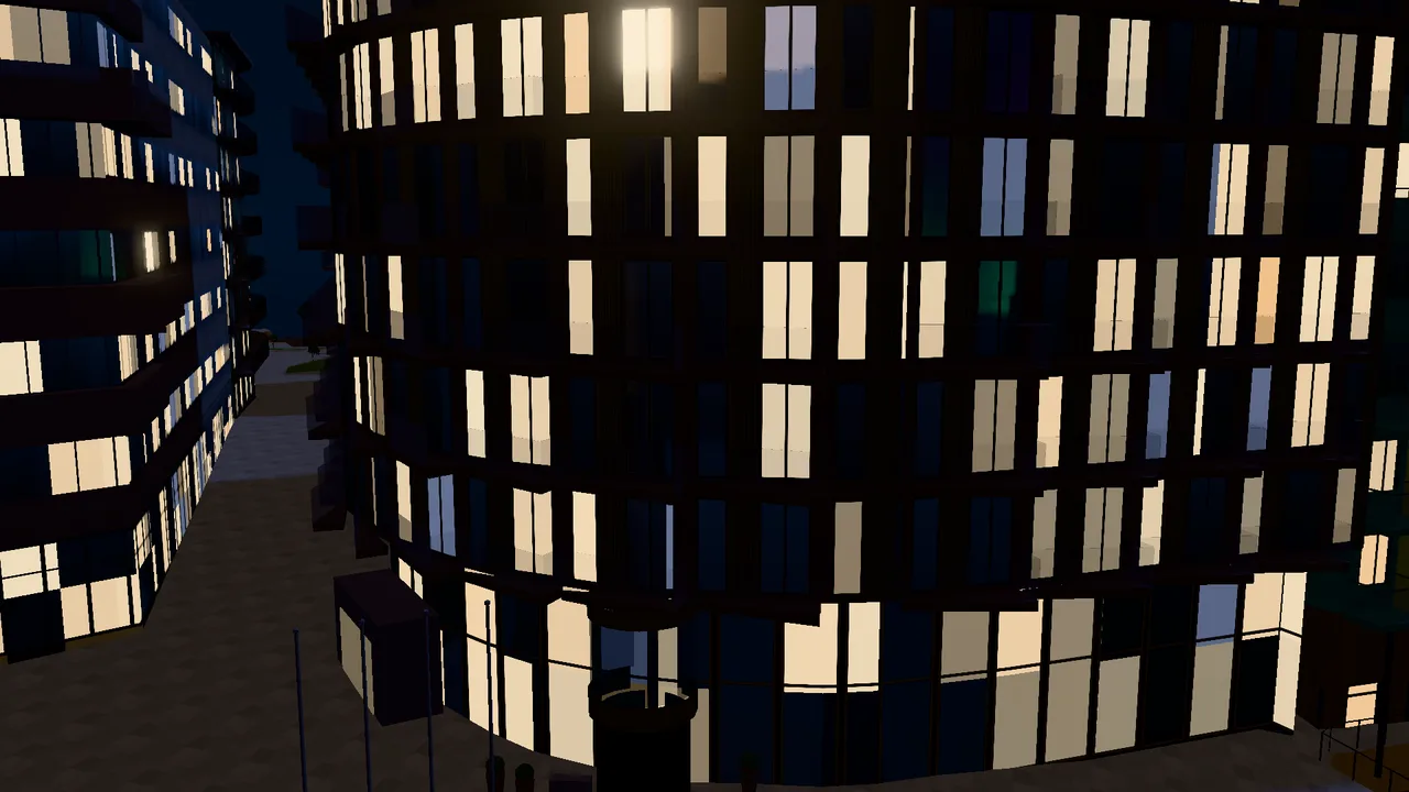 The Thief at night, with lit windows reflected in the canal.
